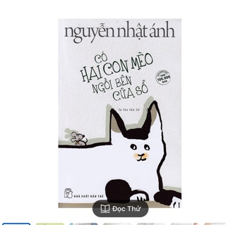 Sổ có 2 con meo ngoi ben cua so
