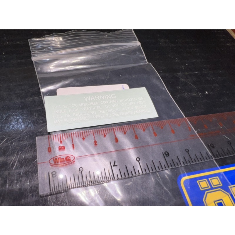 Tem Warning bình dầu phuộc Ohlins