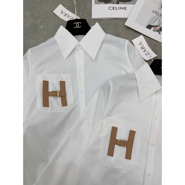 ÁO SƠMI TRẮNG TÚI NGỰC MAY CHỮ H FREESIZE HOT HIT