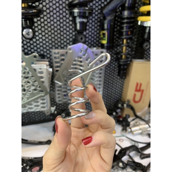 Lò xo inox bắt dây dầu