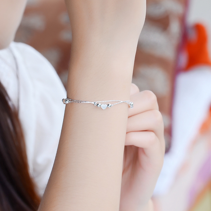 Vòng Tay Chuỗi Hạt Hai Lớp Gắn Mặt Trái Tim Màu Bạc Thời Trang Cho Nữ