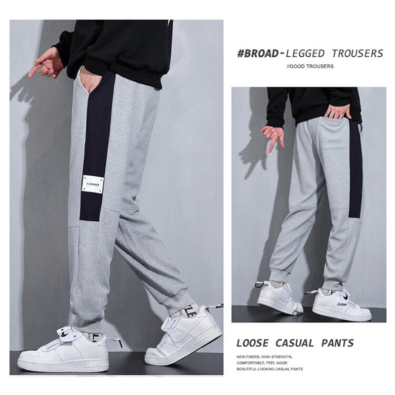 Quần Dài Thể Thao Dáng Rộng Có Túi Sau Lưng Thời Trang Mùa Thu Cho Nam