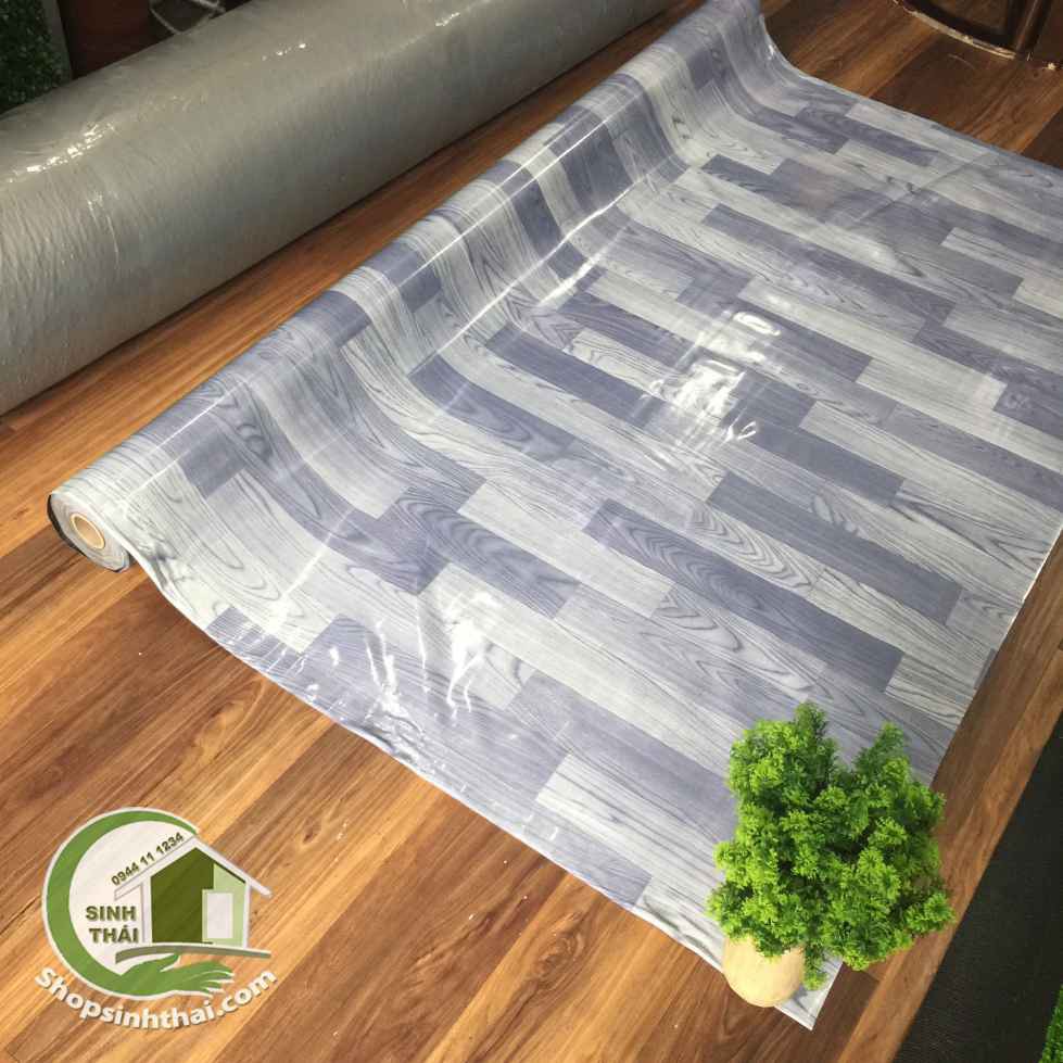 Thảm nhựa PVC simili trải sàn vân gỗ màu xám bóng