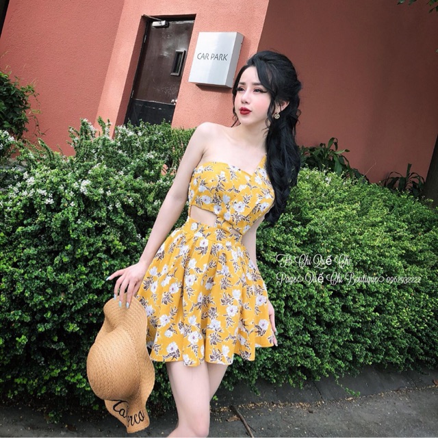 Jumpsuit váy hoa cúc vàng