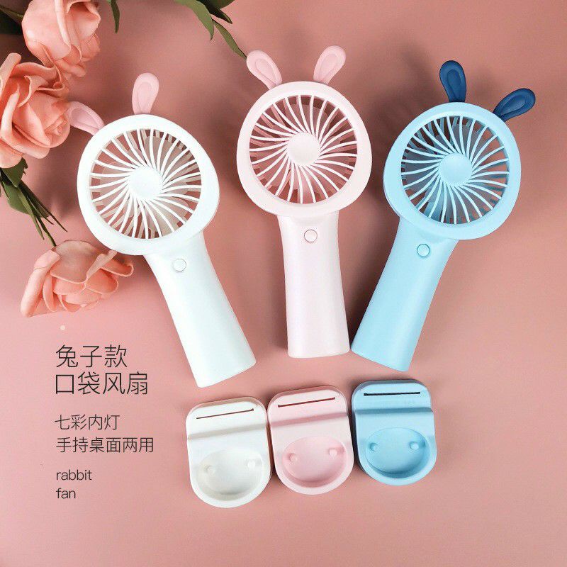 Quạt cầm tay mini có giá để điện thoại.