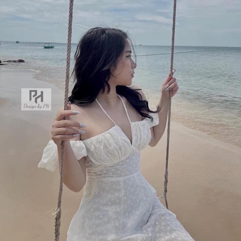 Váy trắng babydoll cổ yếm trễ vai_đầm xoè đi biển ngực thắt nơ