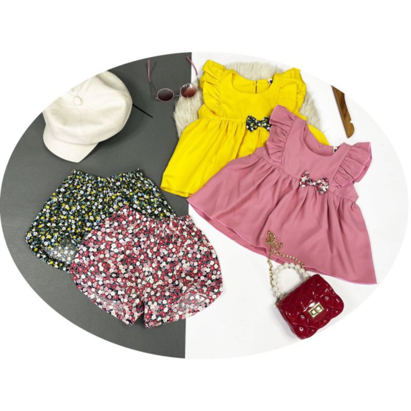 Bộ bé gái áo xòe tay cánh tiên quần đùi hoa