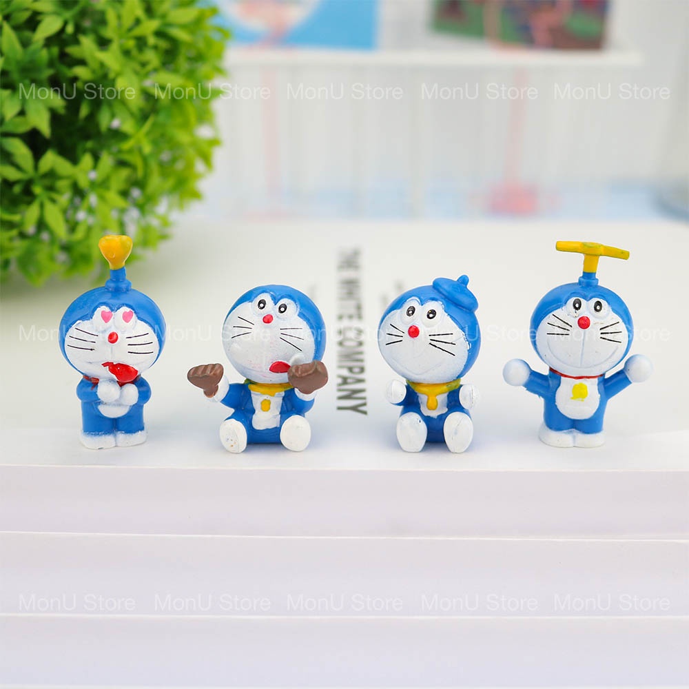 Mô hình DORAEMON DOREMON ăn bánh dễ thương cute MON0135
