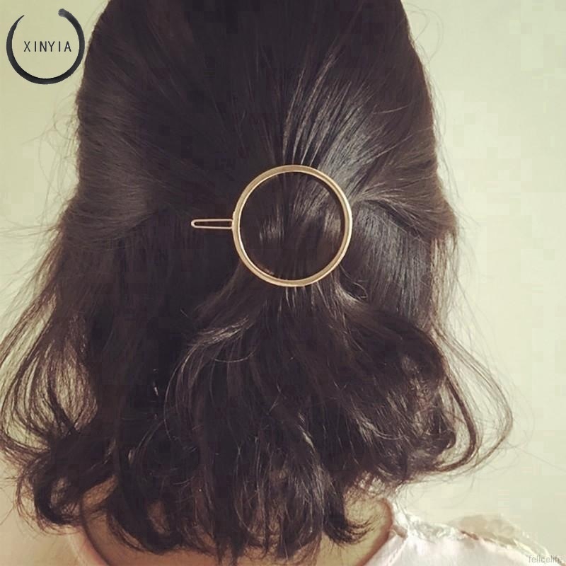 Kẹp tóc hình tam giác màu vàng