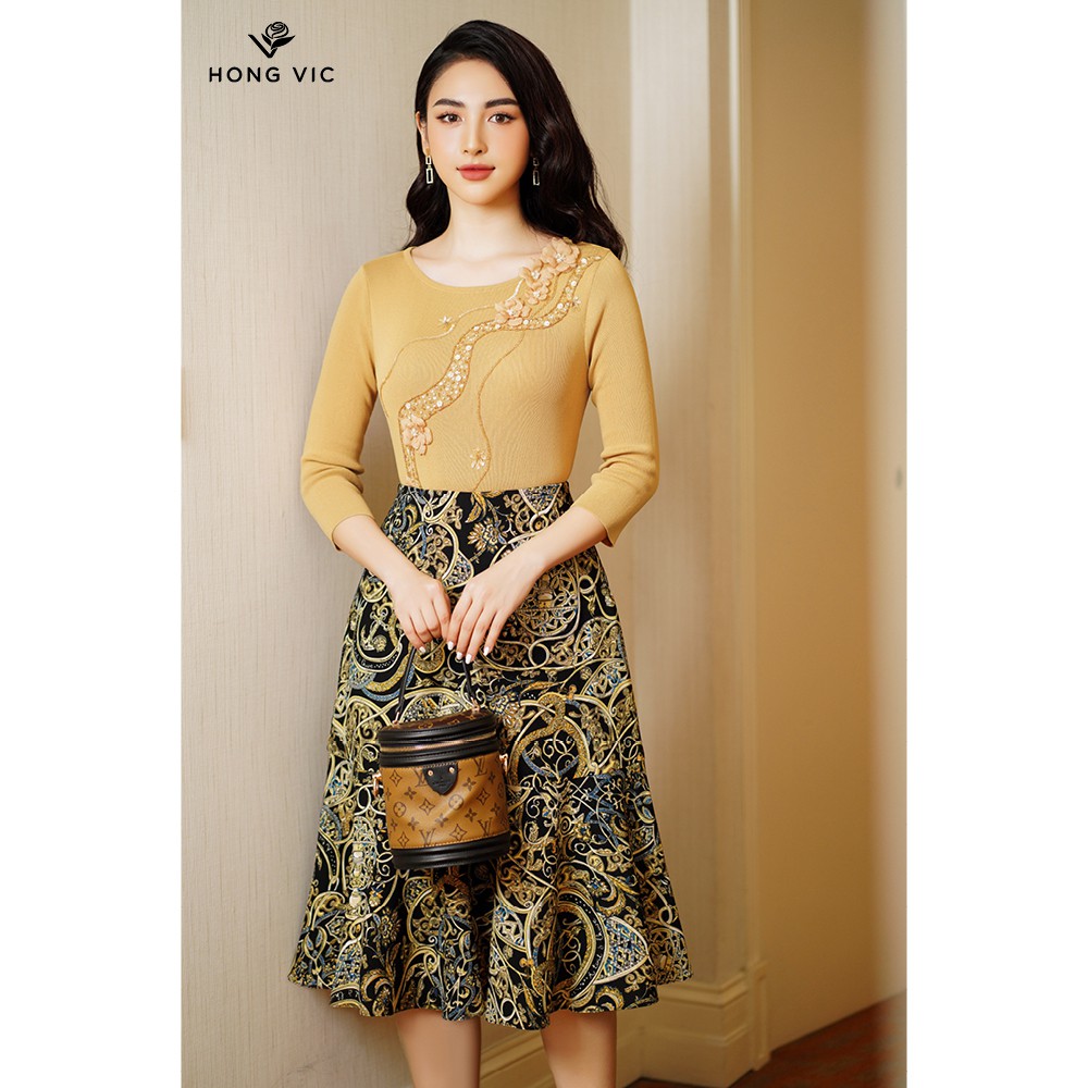 Áo nữ thiết kế Hongvic len vàng kem xẻ tà AL16