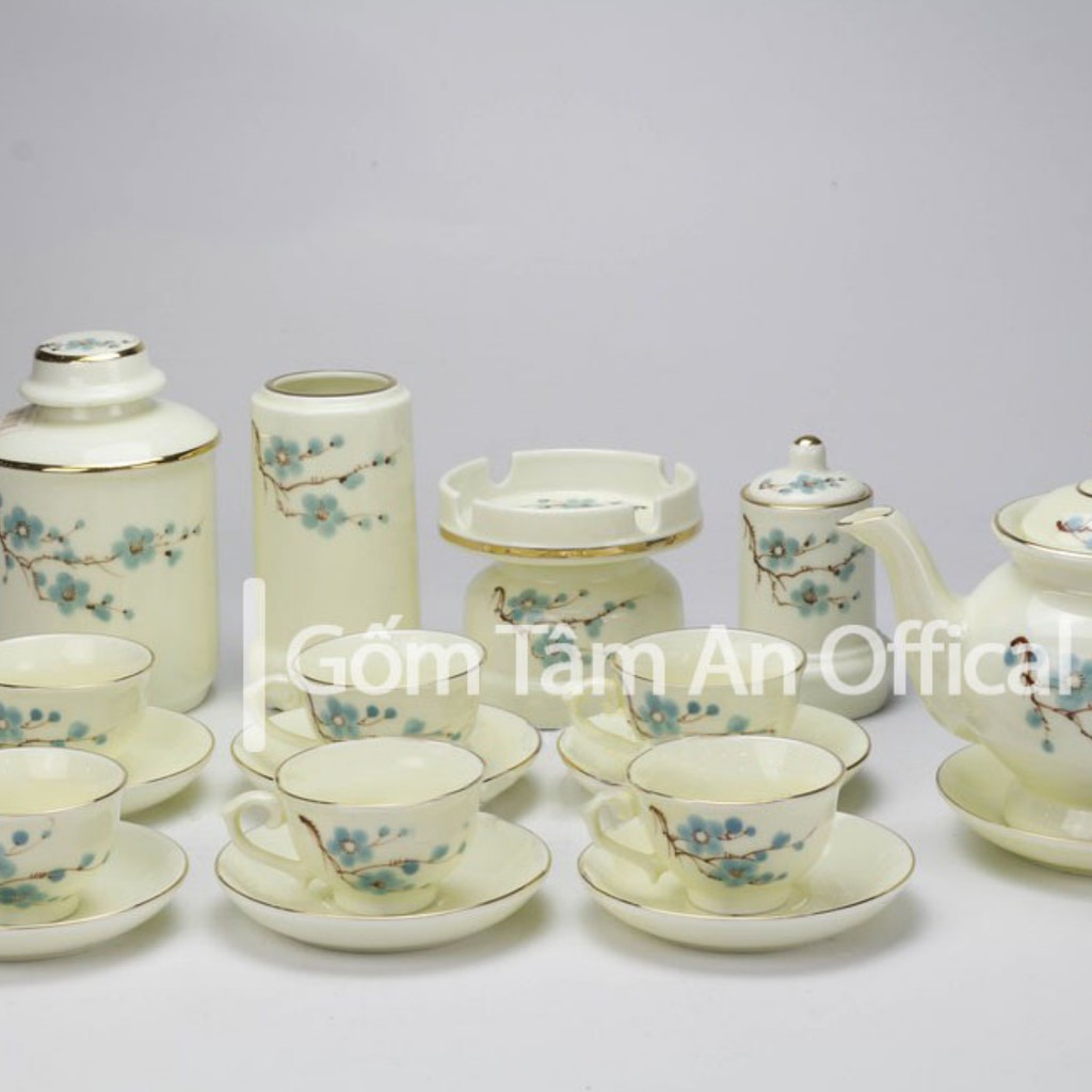 Bộ ấm chén Bát Tràng men trắng vẽ đào xanh cao cấp tâm an