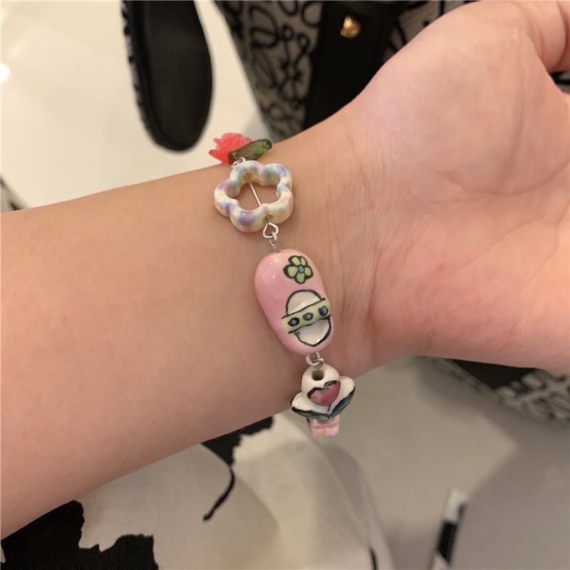 Vòng tay AY chuỗi hạt gốm màu cầu vồng mặt hình hoa mặt cười hoạt hình dễ thương