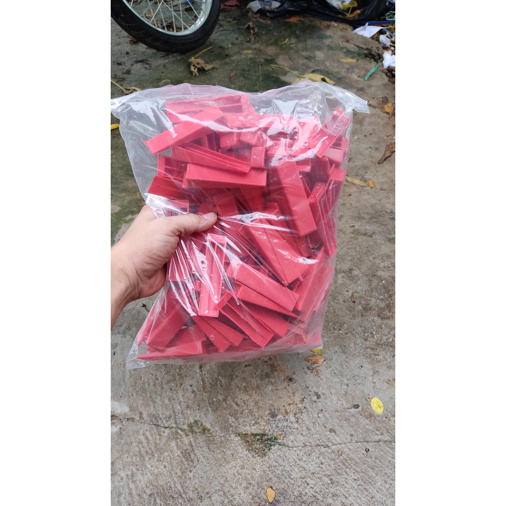 1kg nêm cân bằng tái sử dụng dùng trong ốp lát gạch men