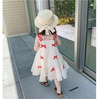 Váy Bé Gái ,  Váy công chúa Hè 2 Dây Đi Biển Màu Trắng Đính Nơ  đỏ Size 7-23kg
