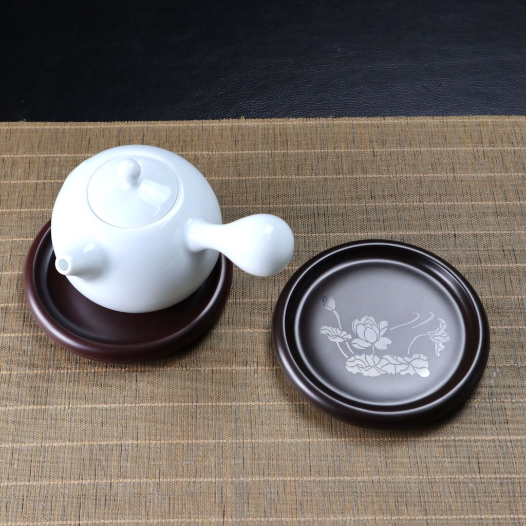 Thuyền Trà Dưỡng Ấm Tử Sa, Đế kê lót ấm chén Bakelite (phíp)