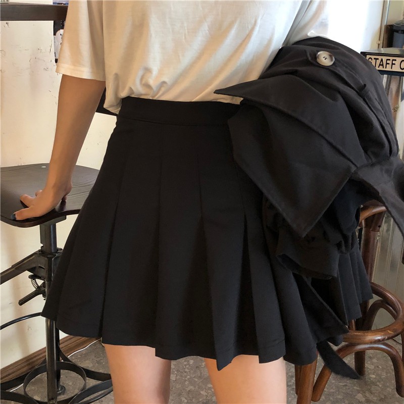 Set áo khoác + chân váy xếp ly