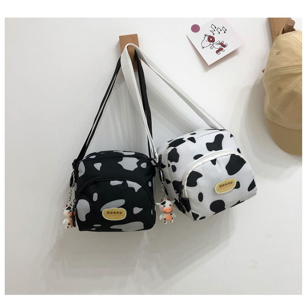 Túi đeo chéo có thể đeo vai họa tiết bò sữa thời trang sành điệu cho nữ
