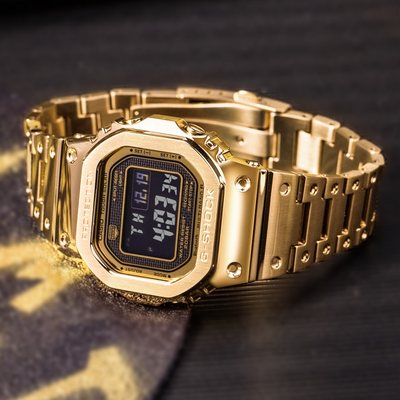 Casio 35 kỷ niệm giới hạn kim loại hộp kim loại gạch vàng năng lượng ánh sáng sóng Bluetooth xem GMW-B5000GD-9