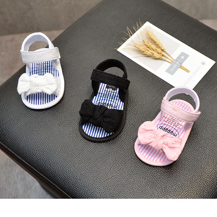 Giày Xăng Đan Đế Mềm Thoáng Khí Chống Trượt Đính Nơ Cho Bé Gái Tập Đi