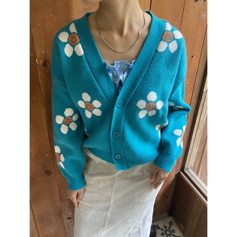 Áo len hoa màu xanh