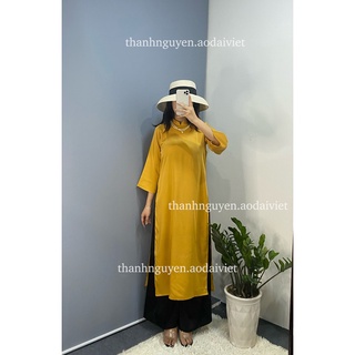 Áo dài vàng cách tân tay loe lụa Ngọc Trai