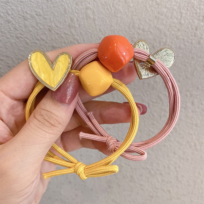 Cột tóc trái tim kèm lục giác màu sắc dây đôi chắc chắn CT132