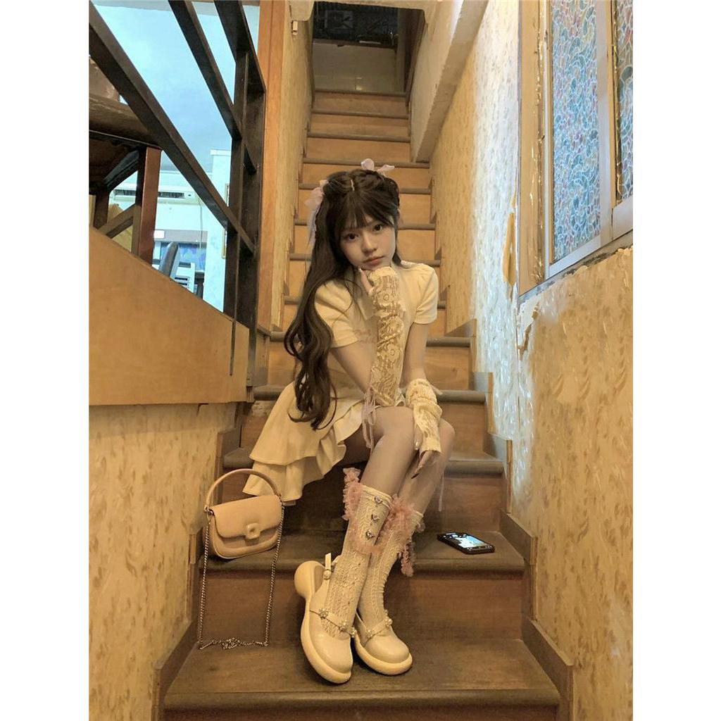 Set Áo Cổ polo + Chân Váy Ngắn Màu Hồng Đính Nơ Xinh Xắn Thời Trang