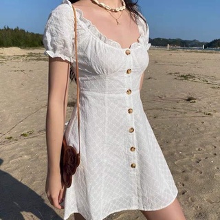 Đầm xô trắng thêu hoa rã ngực