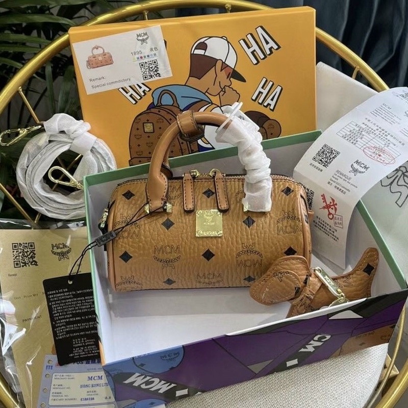 Túi đeo chéo trống mini MCM da thật mềm mại tặng kèm móc cún xinh xắn full box