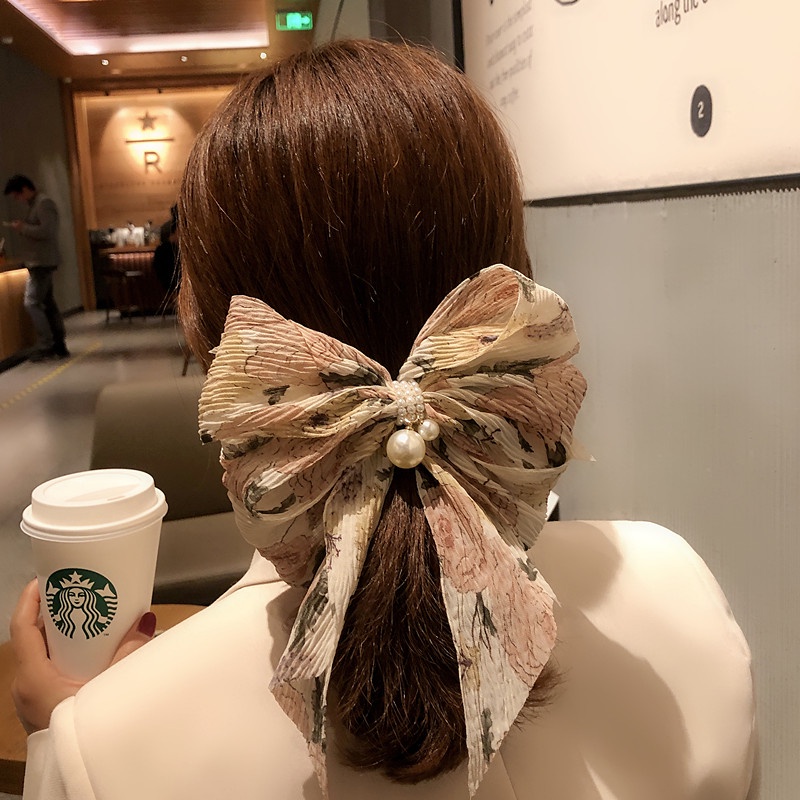 Kẹp tóc hình nơ đính hạt ngọc trai phong cách Hàn Quốc