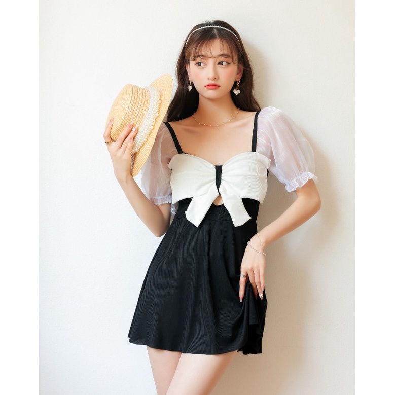 Bộ đồ bơi nữ liền thân dáng váy nơ xinh tay phối voan trắng