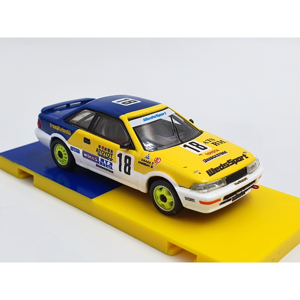 Xe Mô Hình Toyota Corolla Levin AE92 JTC 1993 1:64 Tarmac Works (Vàng Xanh)