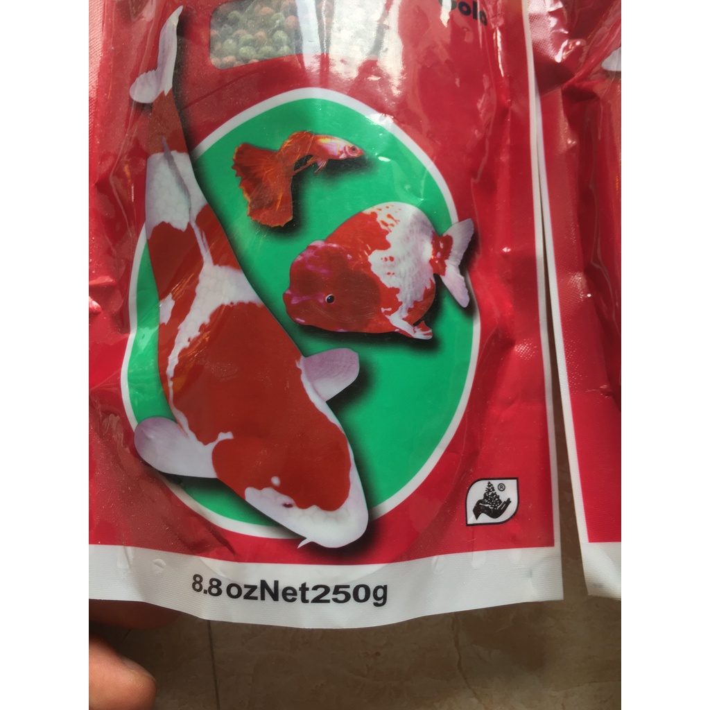 Thức ăn cá KOI,cám SAKURA 250 gram hạt to,hạt nhỏ cao cấp nhập THÁI LAN.