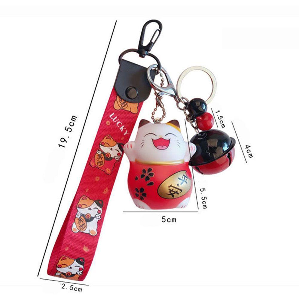 1 Móc Khóa Hình Mèo May Mắn Kèm Chuông Giá Đỡ Túi Xách