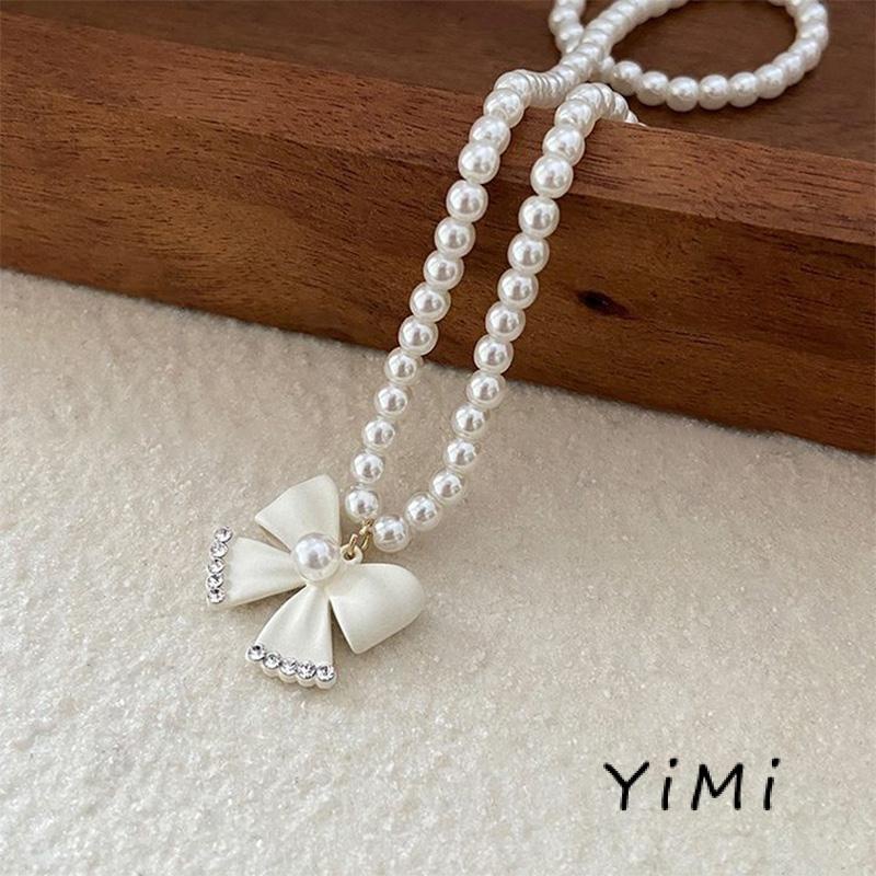 Vòng cổ Mặt Hình Nơ Đính Ngọc Trai Phong Cách Thời Trang 2022