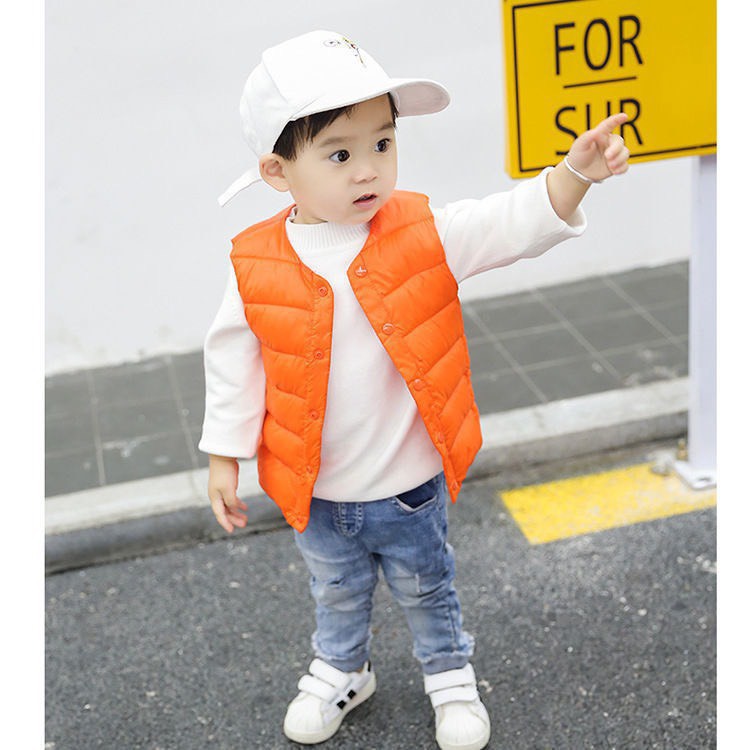 Áo phao gile thu đông cài cúc bé trai bé gái size 90 - 130, cho bạn từ 8-20kg. Chất phao lót bông siêu nhẹ, mịn tay