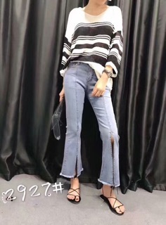 Quần jean ống loe xẻ tà