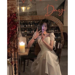 Đầm midi trắng cup ngực phối tay voan thắt nơ