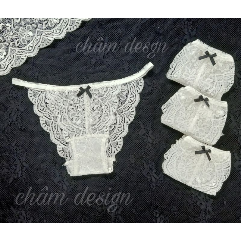 Quần lót trắng gắn nơ đen cạp dây chun nhỏ 2 bên. Hàng thiết kế độc quyền