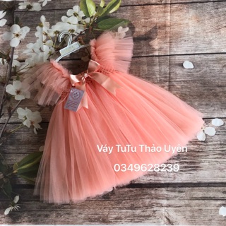 Váy hồng cam nơ cánh tiên - váy tutu hồng cam cánh tiên