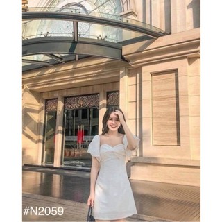 Đầm trắng cúp ngực hình nơ tay phồng