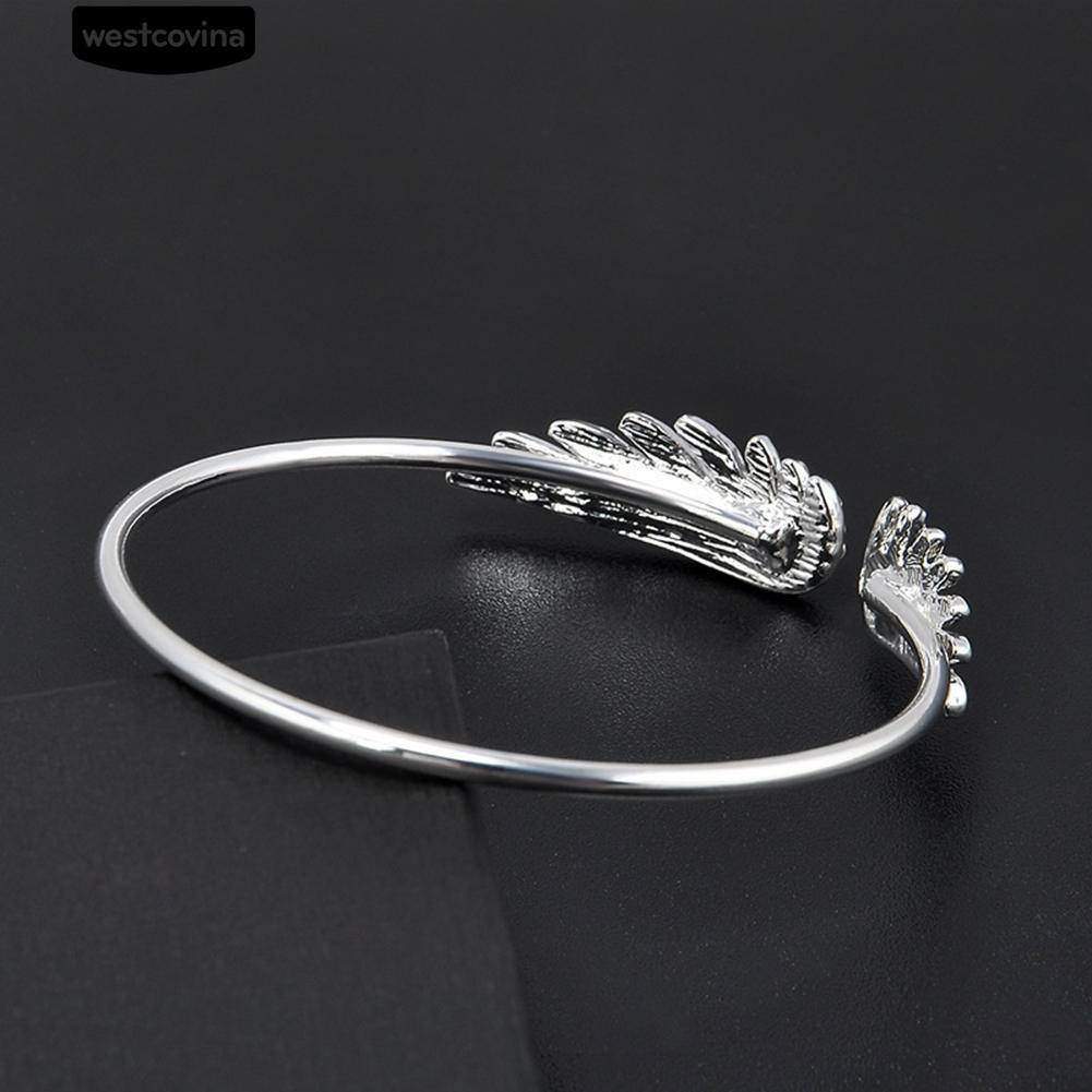 Vòng đeo tay kim loại mạ bạc kiểu cánh chim có phối đá đầy cá tính