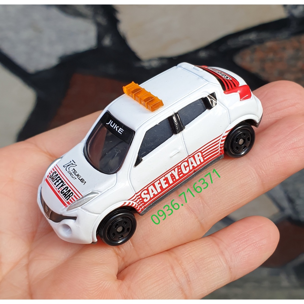 Mô hình xe C ả n h S á t Nissan  màu trắng đèn vàng tomica Nhật Bản