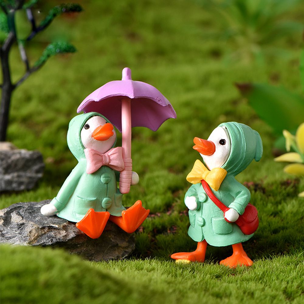 1 Đồ trang trí chú vịt mặc áo mưa dễ thương trang trí sân vườn