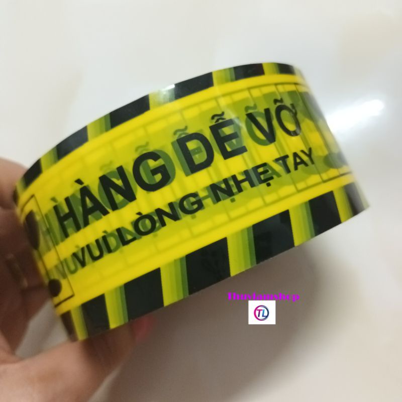 Cuộn băng keo vàng in chữ Hàng dễ vỡ vui lòng nhẹ tay siêu to 200 yard nặng 325g
