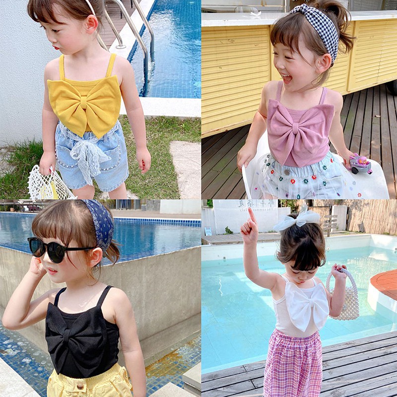 Áo 2 dây thắt nơ sành điệu cho bé gái