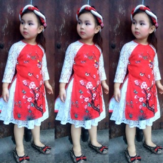 Áo dài gấm hoa đào diện Tết