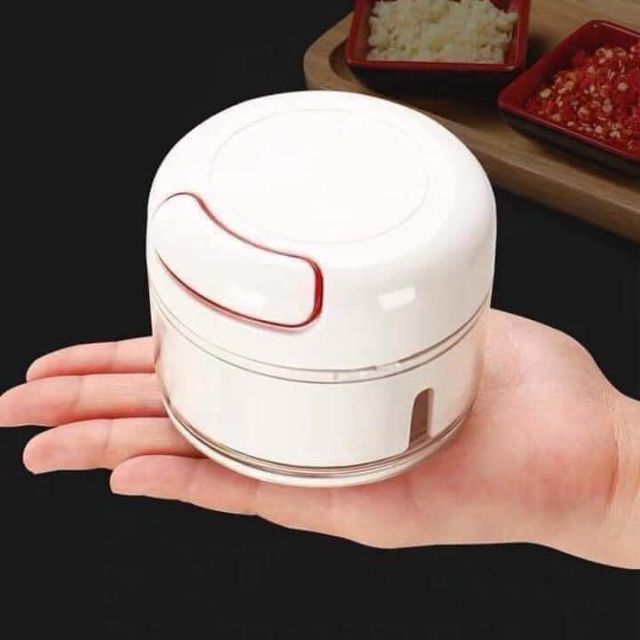 Dụng cụ xay tỏi bằng tay,,,