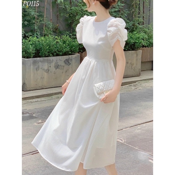 Váy trắng tiểu thư tay phồng hở lưng kết hạt sang trọng