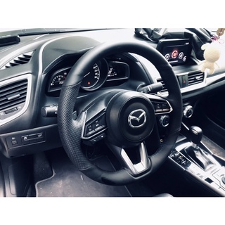 Bọc vô lăng da mazda loại khâu